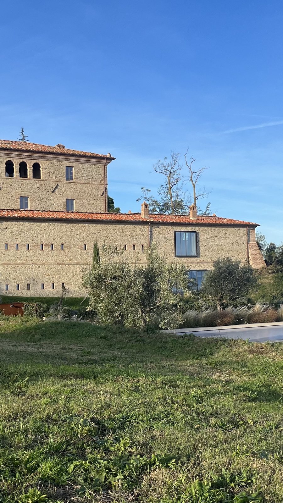 The restored stone farmhouse of Ca' Litardo, in the countryside of Città della Pieve