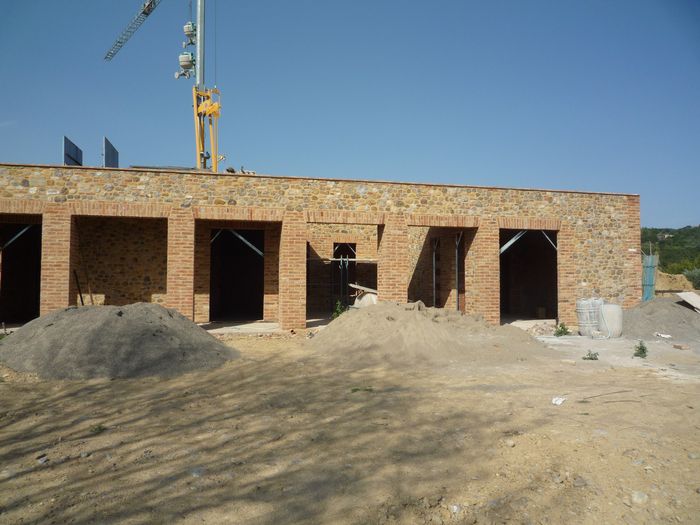 The brick walls of the new volume